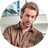 photo of a man with brown hair and a beard