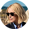 photo of a blonde woman with sunglasses on